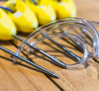 Multiple Original IkiPik fish spikes with yellow handles and curved stainless steel spikes